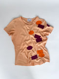 PATCHING THINGS UP T-SHIRT IN PEACH