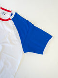 Close-up of a Reworked reclaimed T-shirt turned into a raglan baseball style tee with contrasting sleeves
