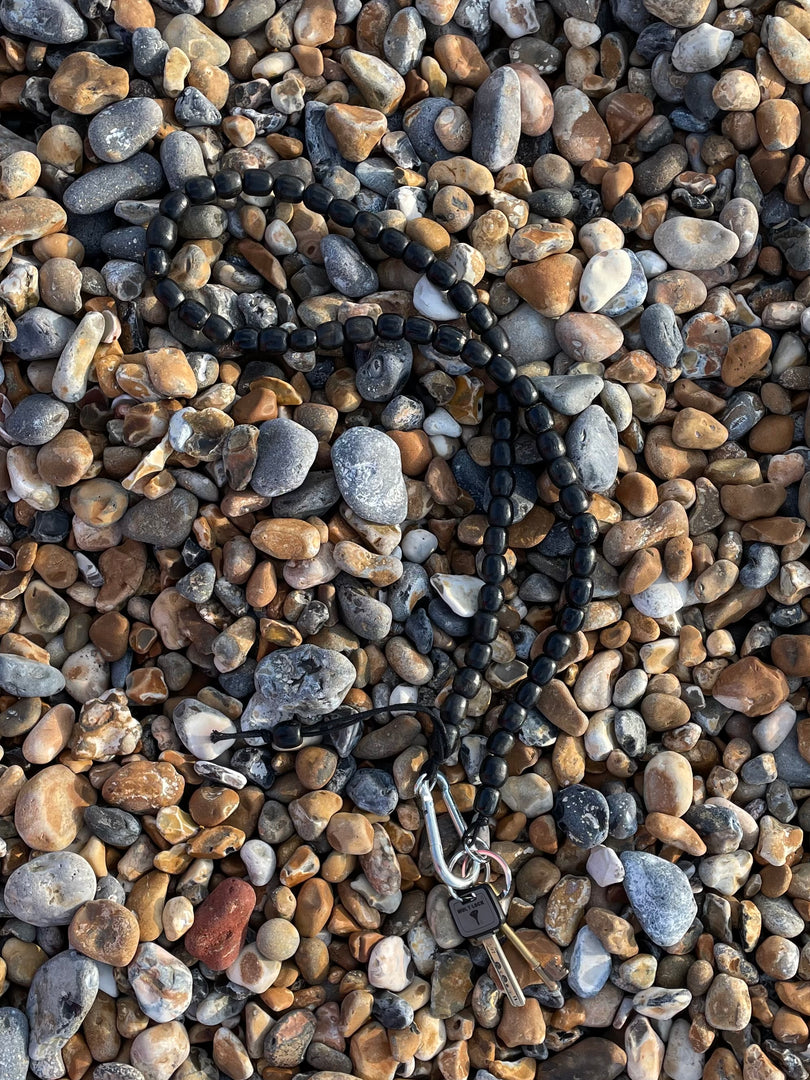 Handmade beaded crossbody keyring with black reclaimed wooden beads and metal carabiner
