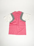 Upcycled panel T-shirt in pink, grey and white, made from second-hand T-shirts and deadstock jersey. Flat lay on white background.