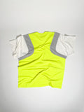 Upcycled panel T-shirt in neon yellow, grey and white, made from second-hand T-shirts and deadstock jersey. Flat lay on white background.
