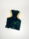 Upcycled panel T-shirt in green, yellow and white, made from second-hand T-shirts and deadstock jersey. Flat lay on white background.