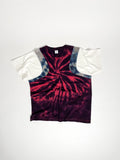 Upcycled panel T-shirt in red, blue and white, made from second-hand T-shirts and deadstock jersey. Flat lay on white background.