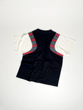 Upcycled panel T-shirt in black, grey stripes and white, made from second-hand T-shirts and deadstock jersey. Flat lay on white background.