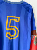 Deai of a blue and orange long sleeve football jersey on a white background