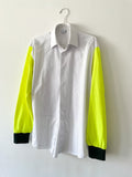 Pleated white shirt with neon yellow T-shirt sleeves on a white background 